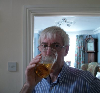Nigel drinking a beer